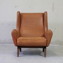 Brown Leather Lounge Chair by ILLUM WIKKELSO