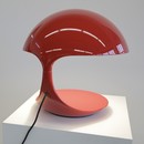 Red COBRA table lamp designed by Elio MARTINELLI